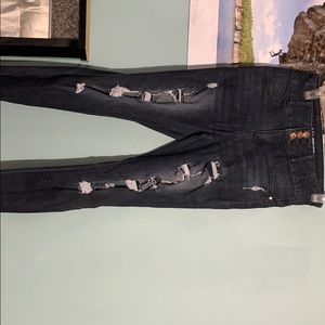 Dark blue high rise jeans.